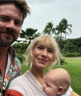 Bear Analu Knighton with his parents Betsy and Zachary Knighton.